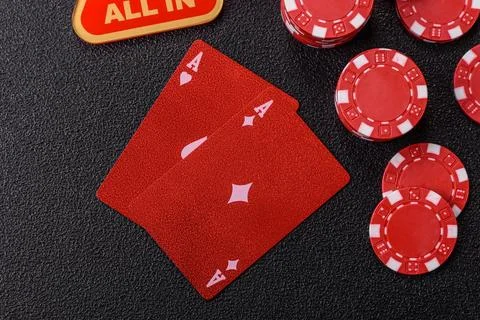 Playing cards and chips on a table, a gambling game of blackjack or baccara.. Photos