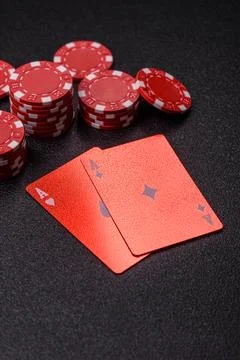 Playing cards and chips on a table, a gambling game of blackjack or baccara.. Photos