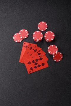 Playing cards and chips on a table, a gambling game of poker. Cards and chips Stock Photos