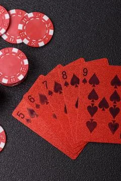 Playing cards and chips on a table, a gambling game of poker. Cards and chips Photos