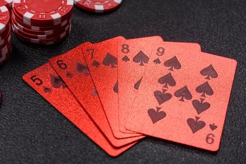 Playing cards and chips on a table, a gambling game of poker. Cards and chips Photos