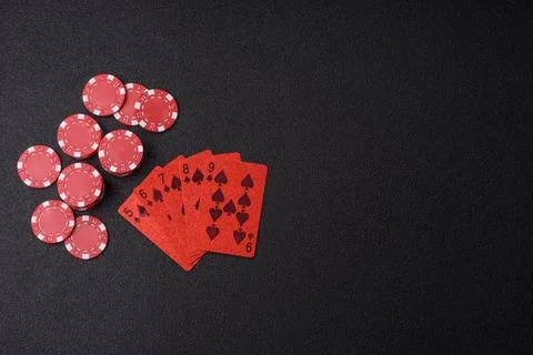 Playing cards and chips on a table, a gambling game of poker. Cards and chips Photos