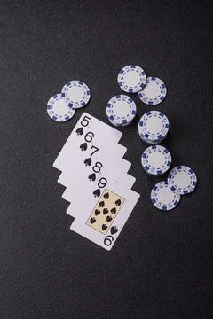 Playing cards and chips on a table, a gambling game of poker. Cards and chips Photos