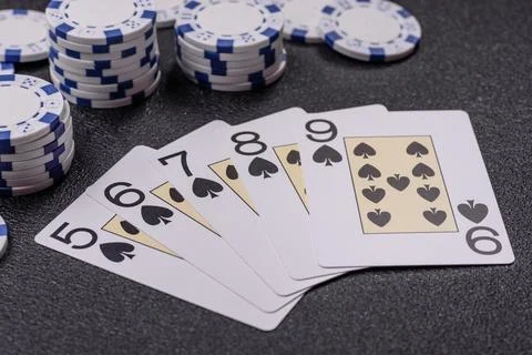 Playing cards and chips on a table, a gambling game of poker. Cards and chips Photos