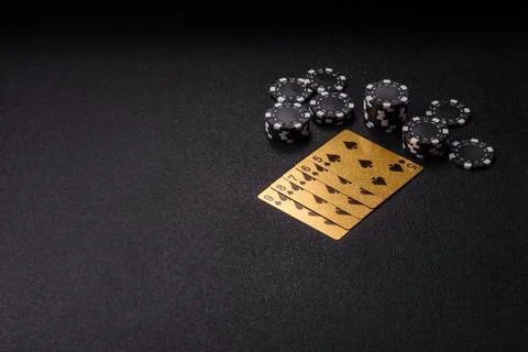 Playing cards and chips on a table, a gambling game of poker. Cards and chips Photos