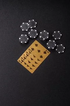 Playing cards and chips on a table, a gambling game of poker. Cards and chips Stock Photos
