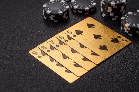 Playing cards and chips on a table, a gambling game of poker. Cards and chips Photos