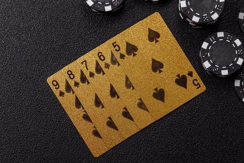 Playing cards and chips on a table, a gambling game of poker. Cards and chips Stock Photos