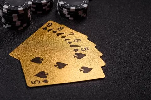 Playing cards and chips on a table, a gambling game of poker. Cards and chips Stock Photos