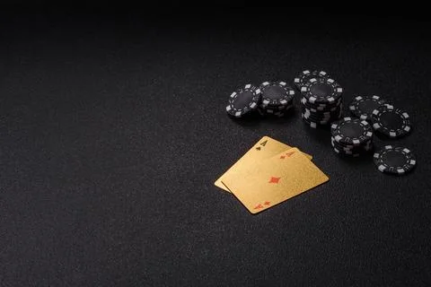 Playing cards and chips on a table, a gambling game of blackjack or baccara.. Photos