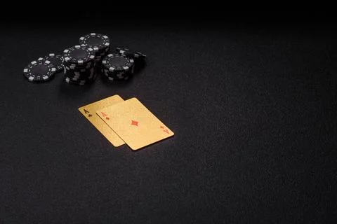Playing cards and chips on a table, a gambling game of blackjack or baccara.. Photos