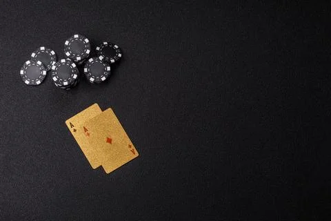 Playing cards and chips on a table, a gambling game of blackjack or baccara.. Photos