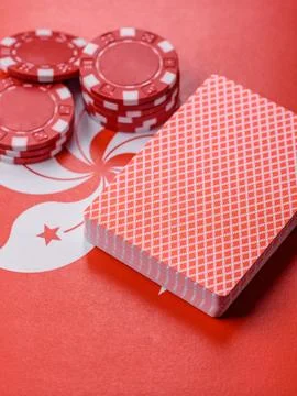 Playing cards and chips on a table, a gambling game of blackjack or baccara.. Photos
