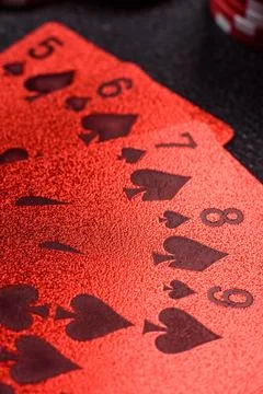 Playing cards and chips on a table, a gambling game of poker. Cards and chips Stock Photos