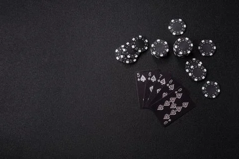 Playing cards and chips on a table, a gambling game of poker. Cards and chips Stock Photos