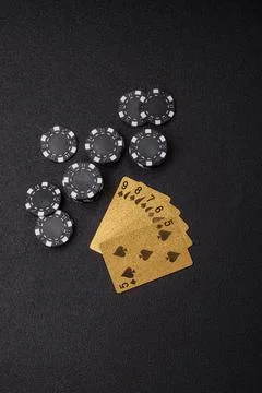 Playing cards and chips on a table, a gambling game of poker. Cards and chips Stock Photos