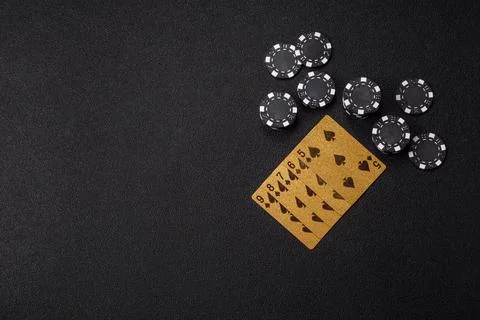 Playing cards and chips on a table, a gambling game of poker. Cards and chips Stock Photos