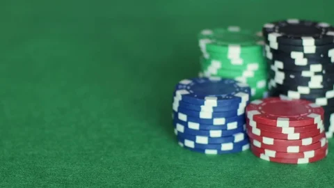 Playing cards are thrown next to casino chips Stockbeeldmateriaal 70376085