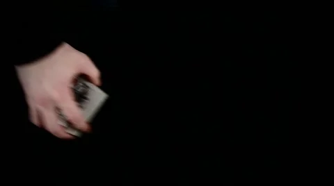 Playing cards being spread on a black surface by magician, slow motion Stock Footage 57708671