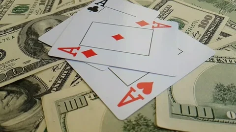Playing cards falling dollars background slow-motion shooting Stock Footage 88091577