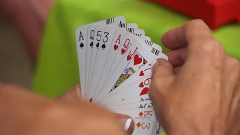 Playing cards hand during a bridge game 6 Stock Footage 199796069