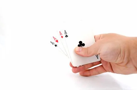 Playing cards in hand Stock Photos
