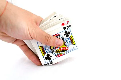 Playing cards in hand Stock Photos