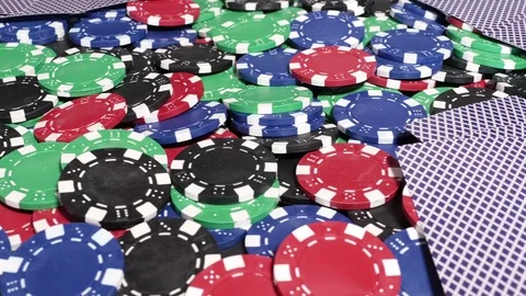 Playing cards lying on chips Stockbeeldmateriaal 70376083