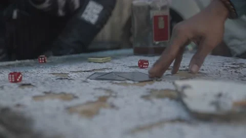 Playing cards on a puzzle table Stock Footage 145911247