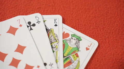 Playing cards on the red gambling table. Vidéo 223824207
