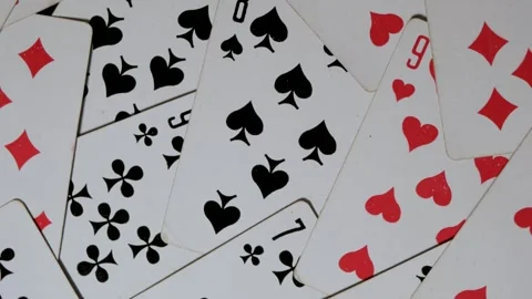 Playing cards rotate around an axis. View from Stock Footage 305091790