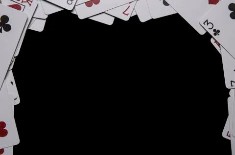 Playing cards on square table Stock Photos