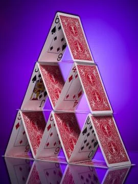 Playing cards stacked in a pyramid shape Foto stock