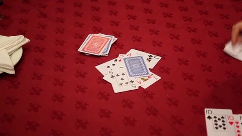 Playing cards on table Stock Footage 77047224