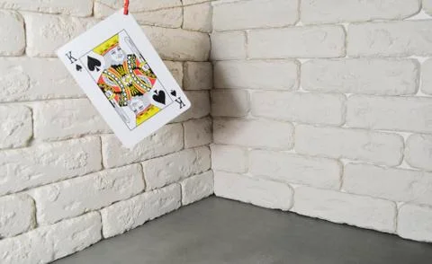 Playing cards on wall background Stock Photos