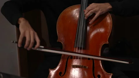 Playing the cello close up Stock Footage 148759115