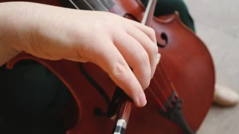 Playing a Cello Stock Footage 144971691