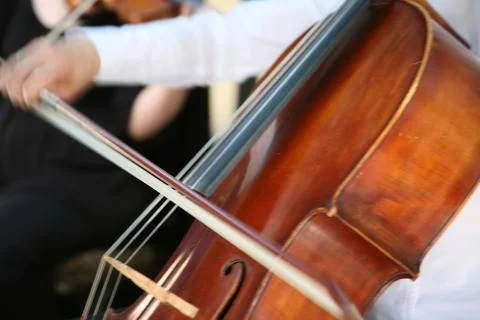 Playing cello, hand close up Stock Photos