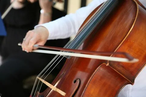 Playing cello, hand close up Stock Photos