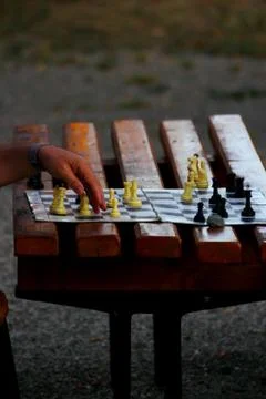 Playing chess at dusk Stock Photos