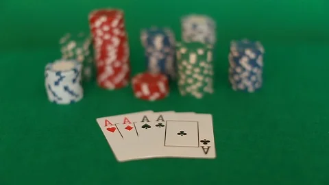 Playing chips and cards are on the green table Stock Footage 102646002