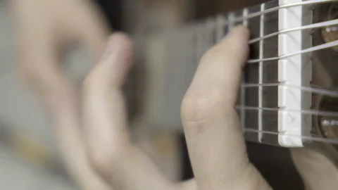 Playing classical guitar. Slow motion Stock Footage 121897401