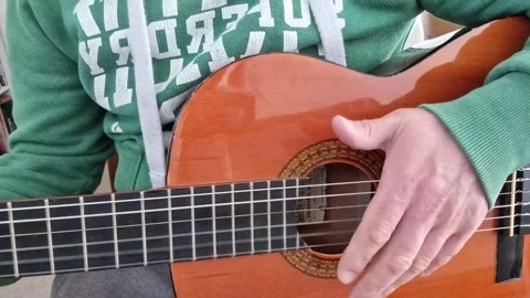 Playing a classical spanish guitar with nylon strings Stock Footage 194539948