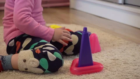 Playing with the colored pyramid Stock Footage 195307480