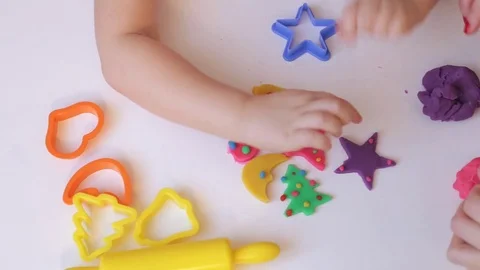 Playing with colorful modelling clay Stock Footage 71325569