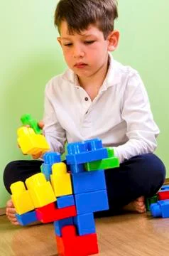 Playing with construction toy blocks Stock Photos