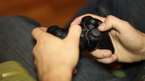 Playing on controller from Playsation 3 Stock Footage 57030505