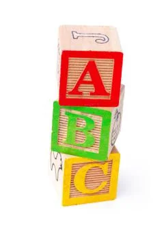 Playing cubes with alphabets abc arranged over each other Stock Photos