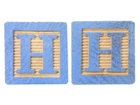 Playing cubes with alphabets h Stock Photos