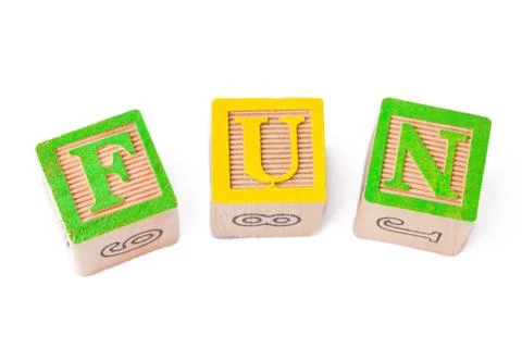 Playing cubes arranged side by side over white background Stock Photos